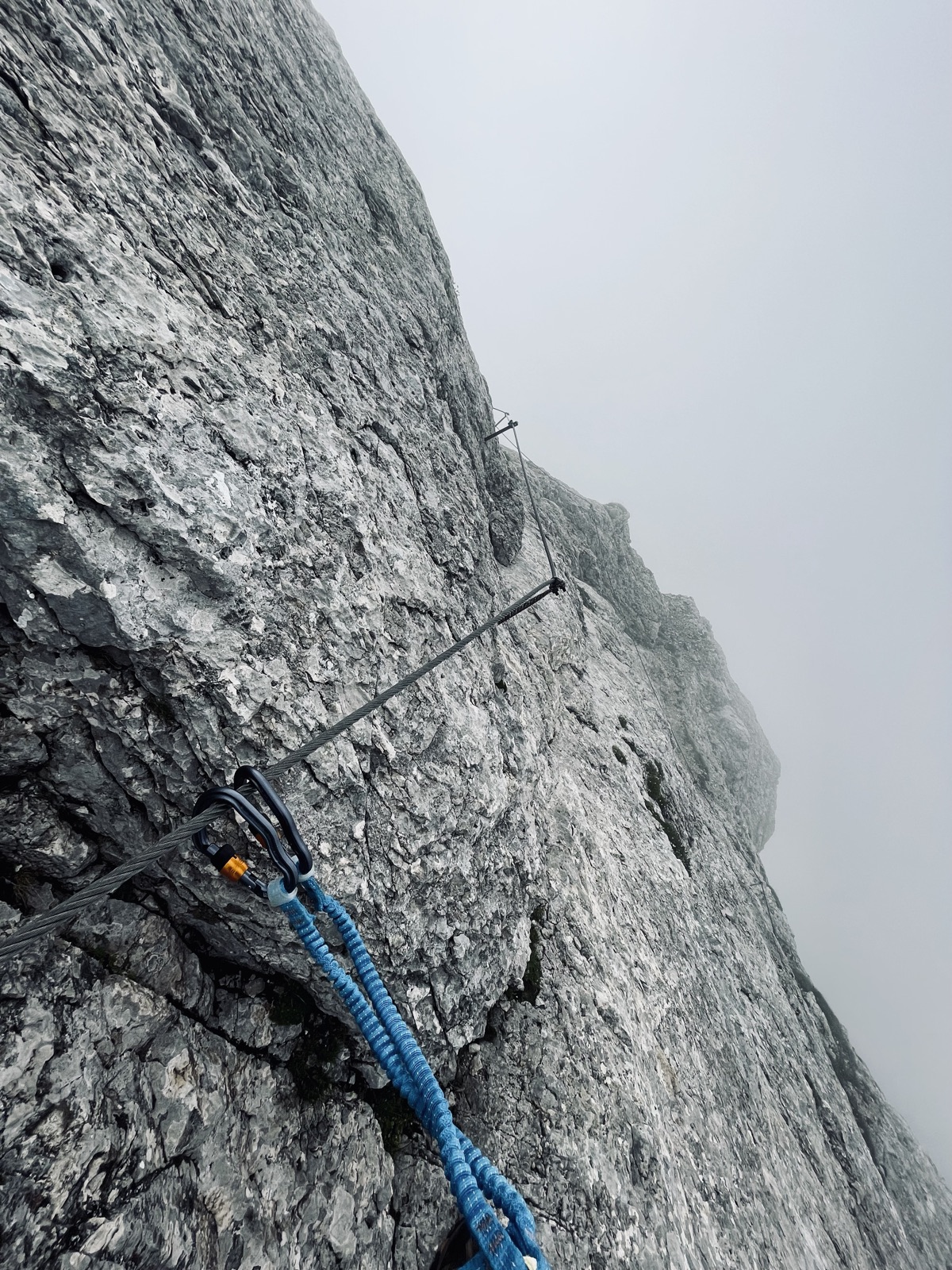 via ferrata in the fog · hands on steel